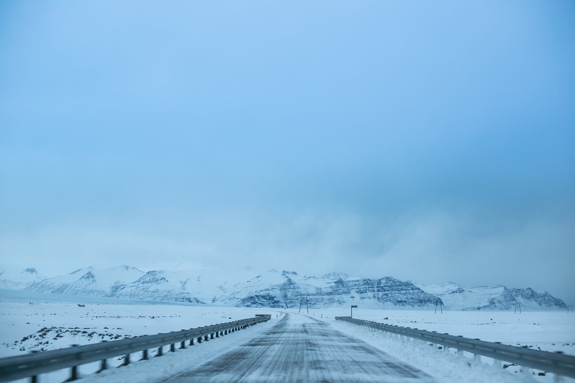 a highway that is in the middle of snow