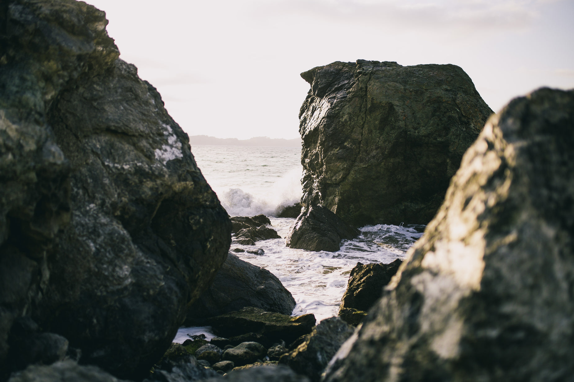 a po taken from the rocks looking at a small wave