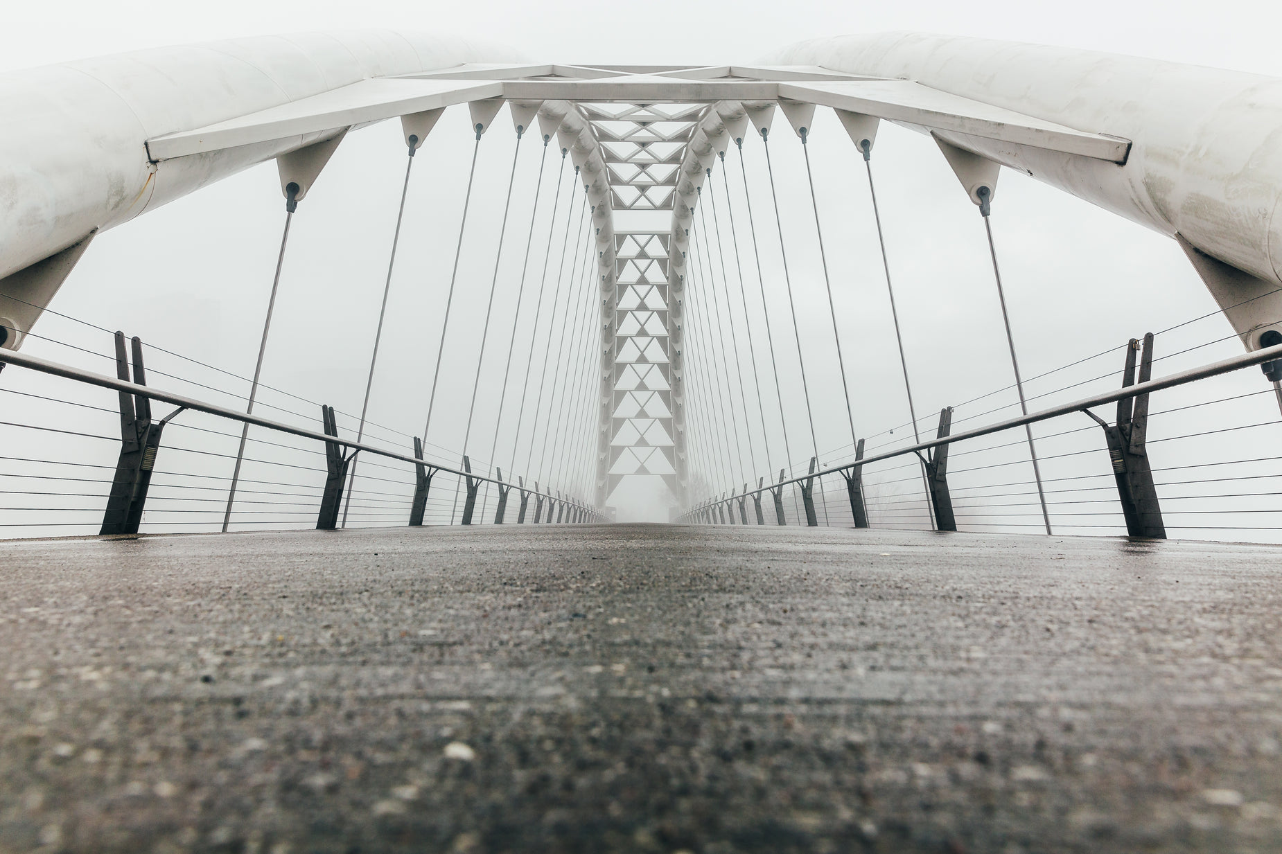 an image of the white bridge taken on a foggy day