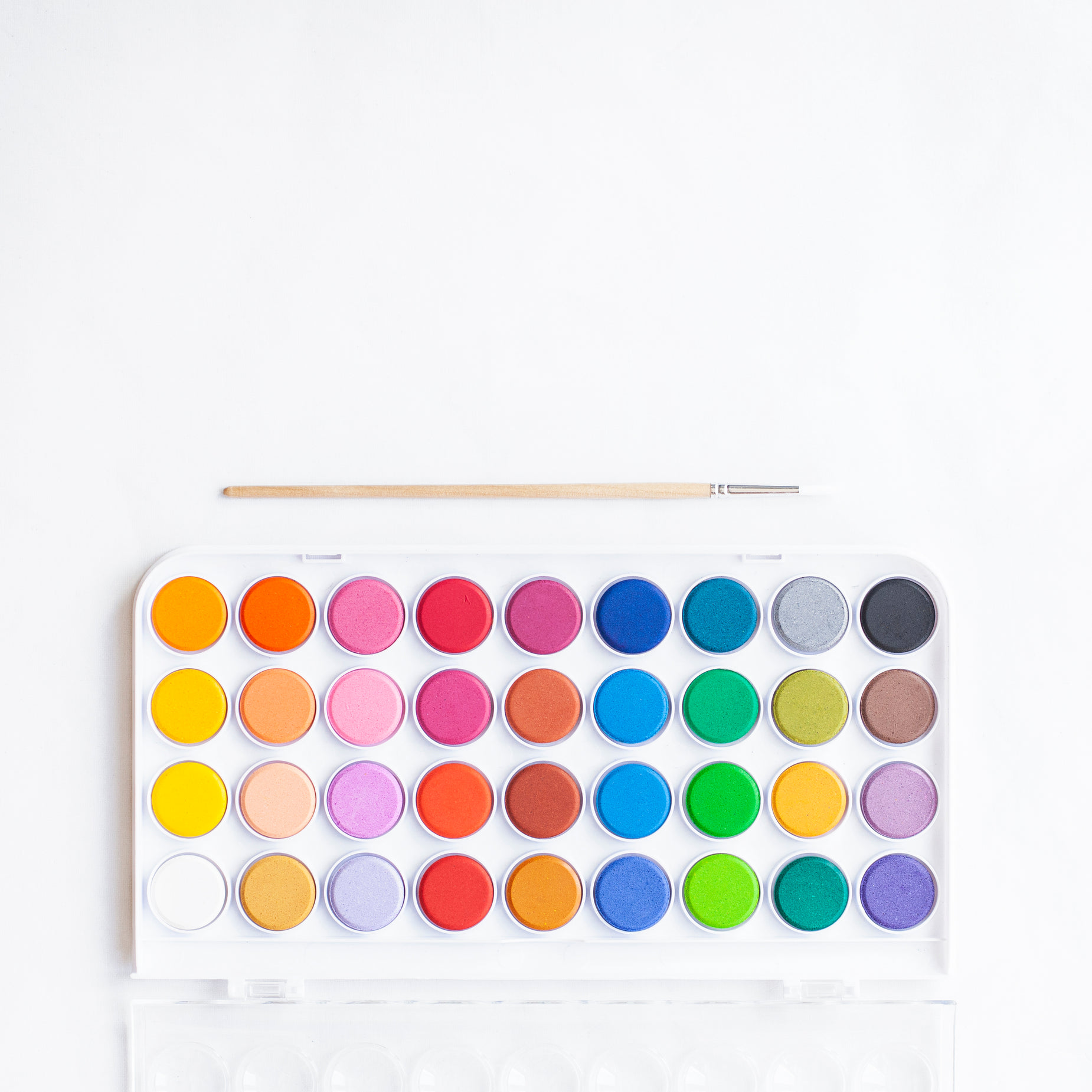 an image of a white palette with paint
