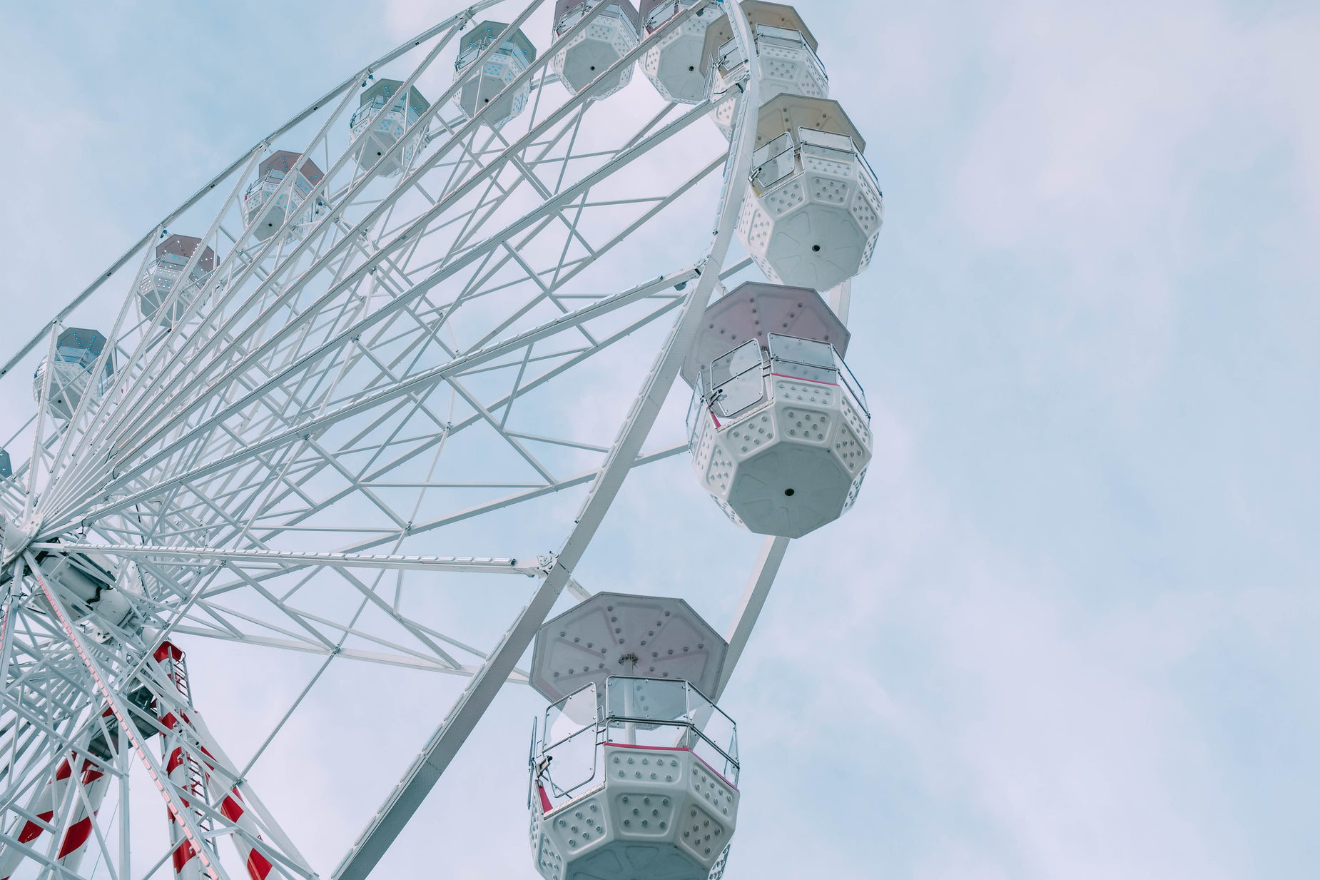 a very big big pretty ferris wheel against a blue sky