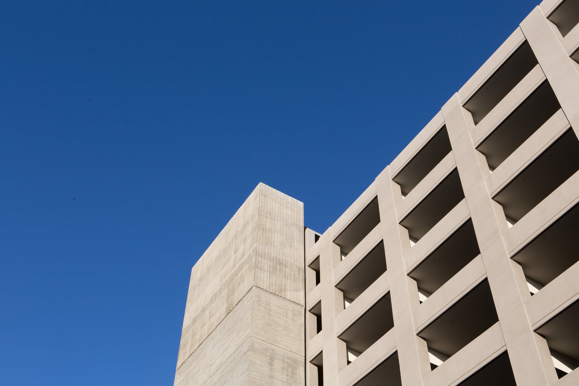 the side of a building and a blue sky