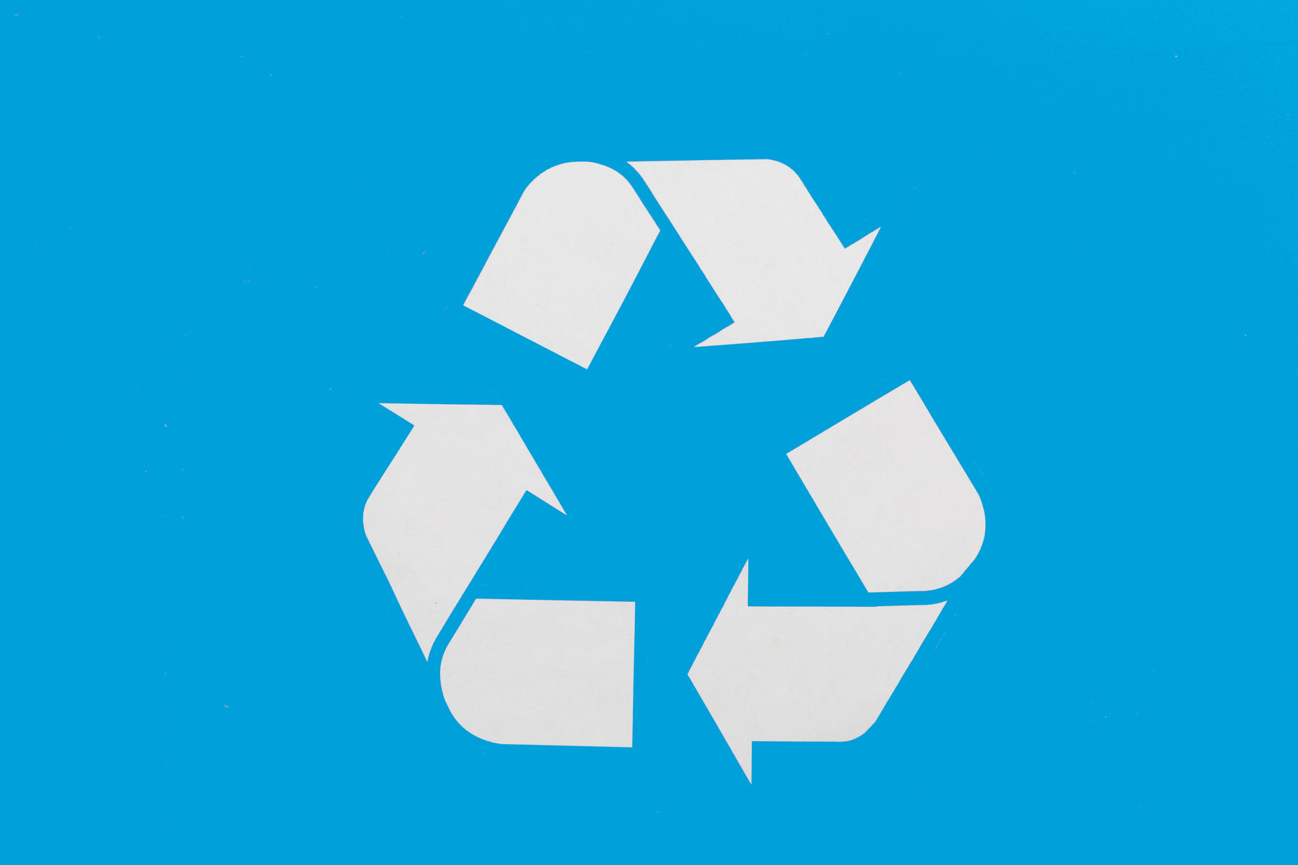 a blue recycling sign with a recycling symbol