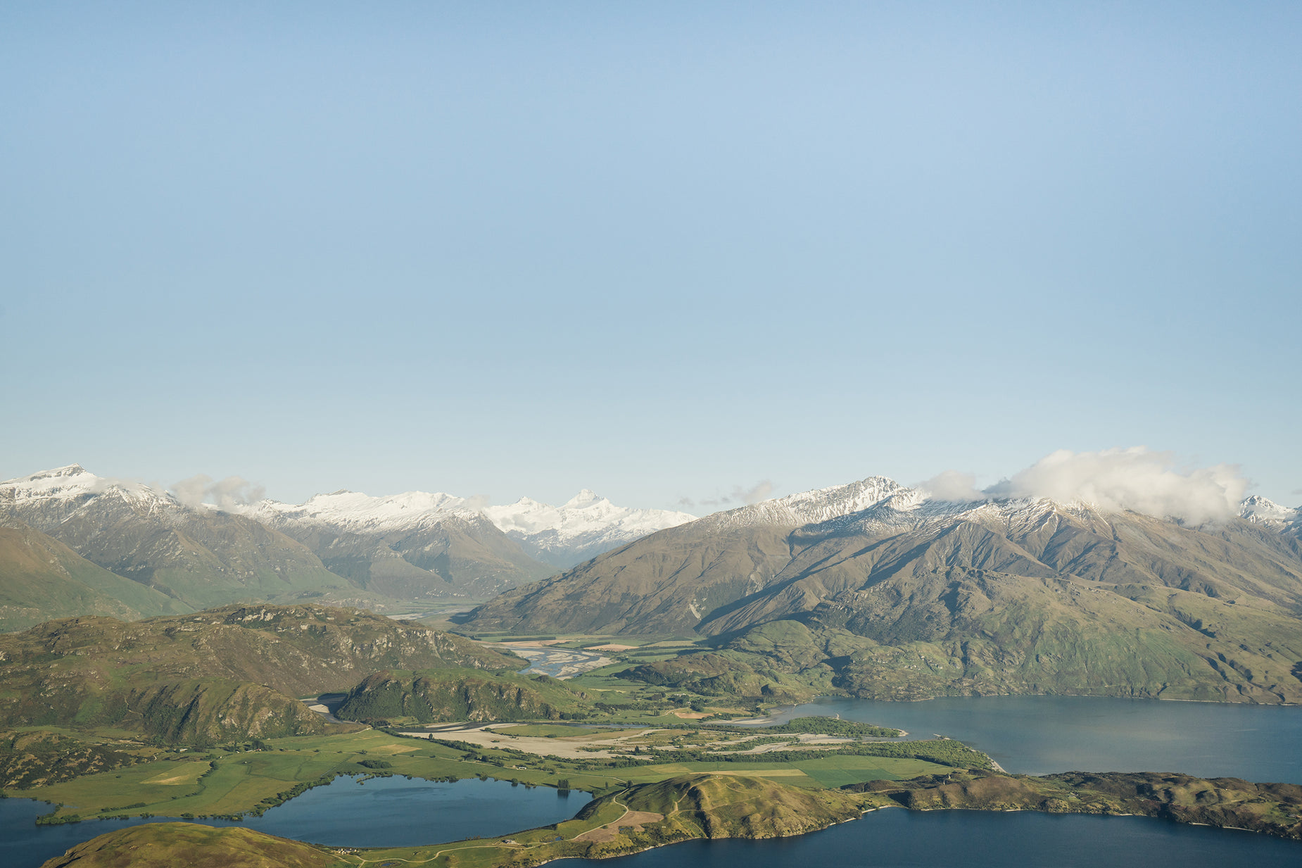 a landscape po taken from an airplane in a mountain range