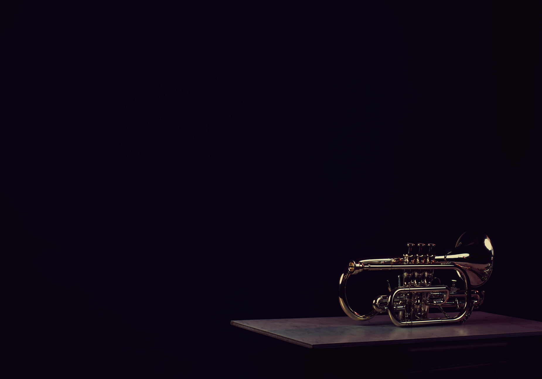 an instrument that is on top of a wooden table