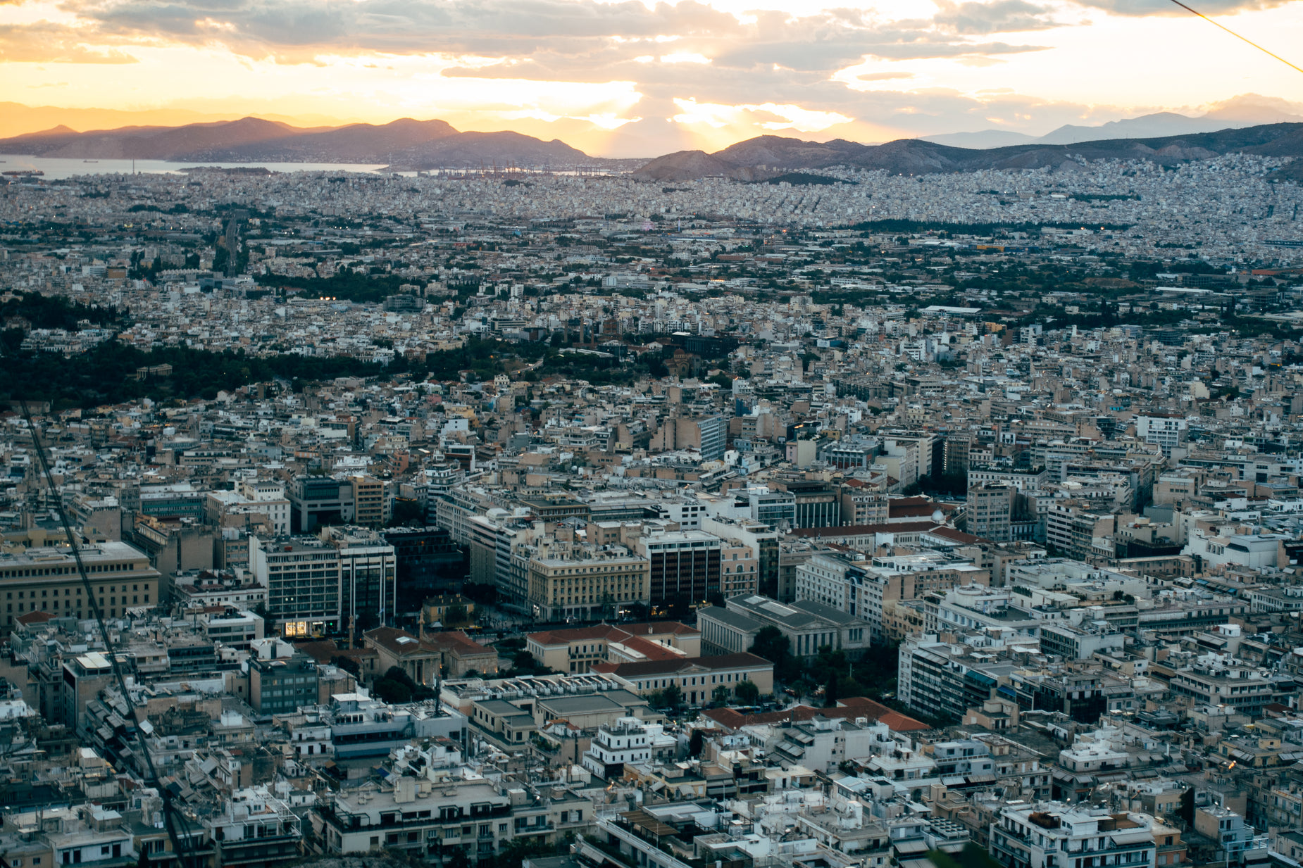 a view of the city from above of a mountain