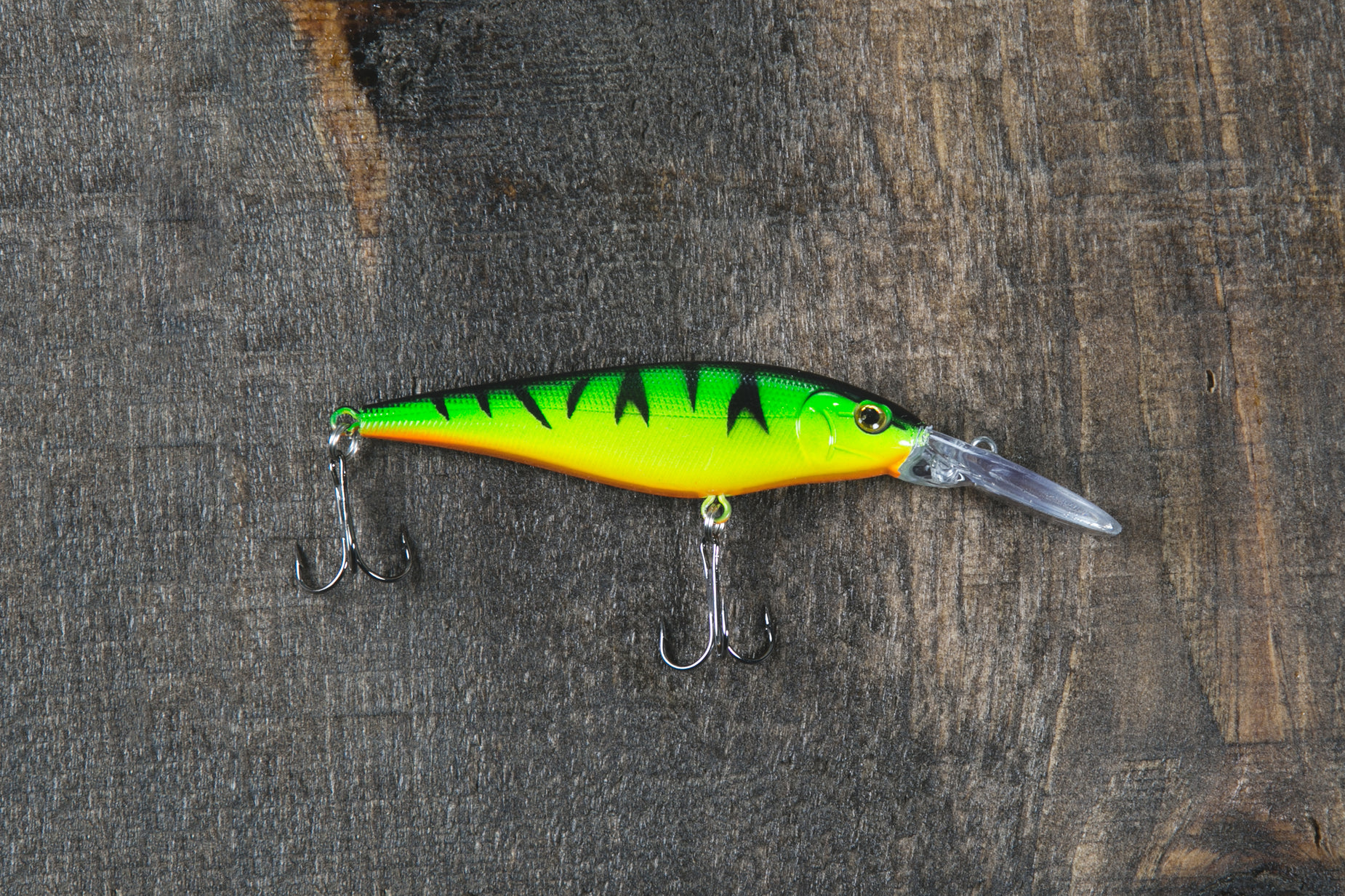 a lure that is hanging on the side of a hook
