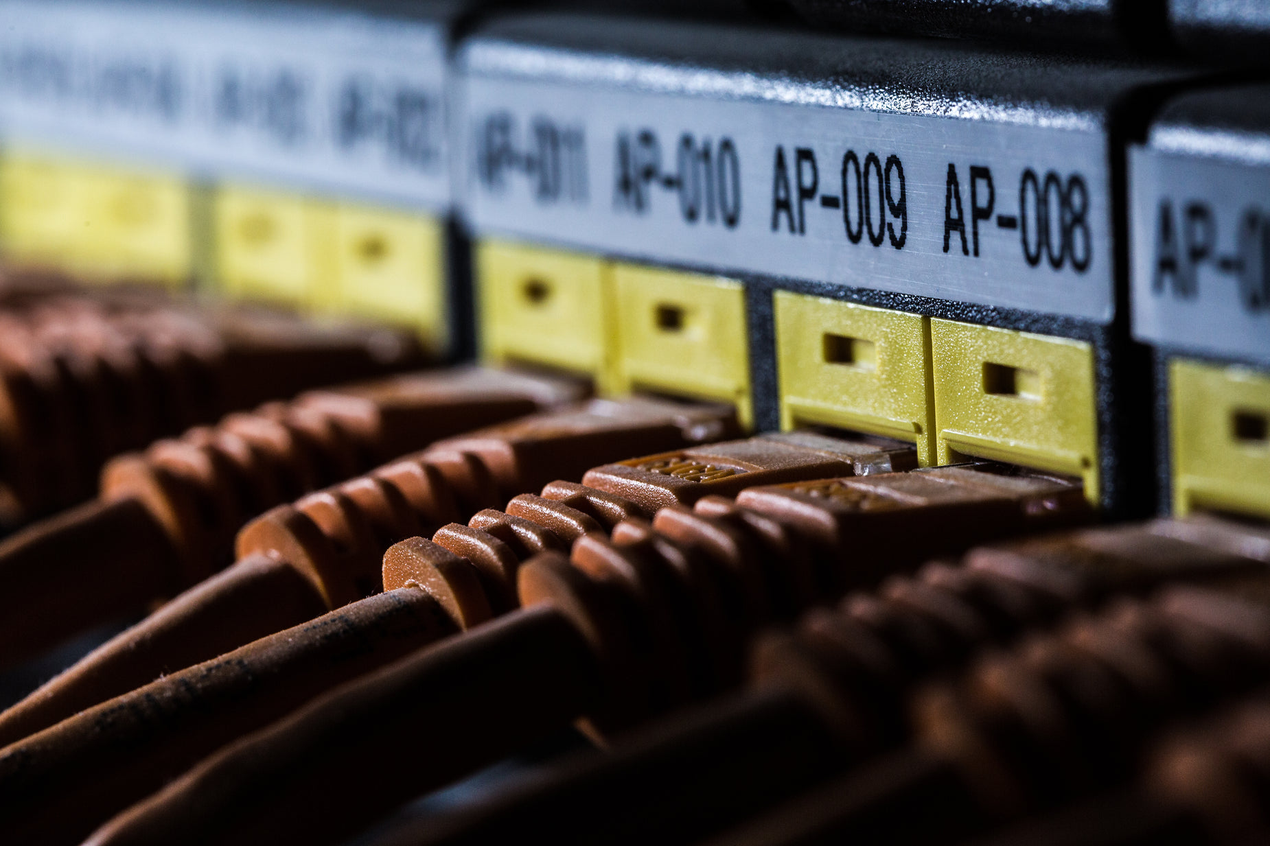 a closeup image of a row of electric switches