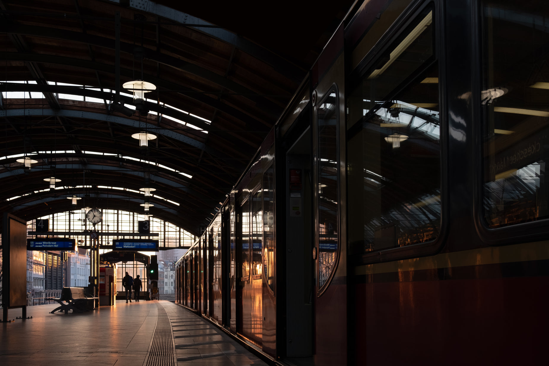 the train is parked at the train station