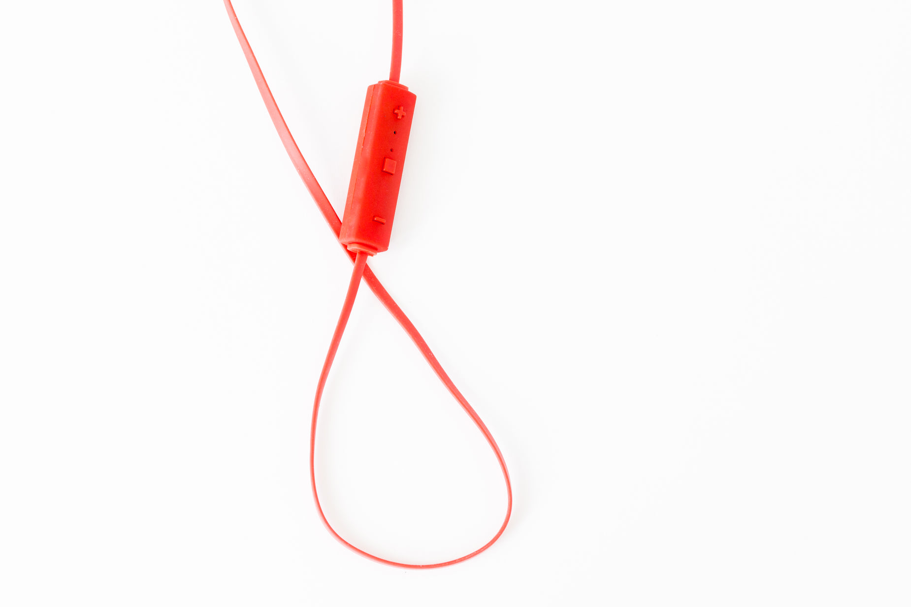 an orange object is attached to a black cord