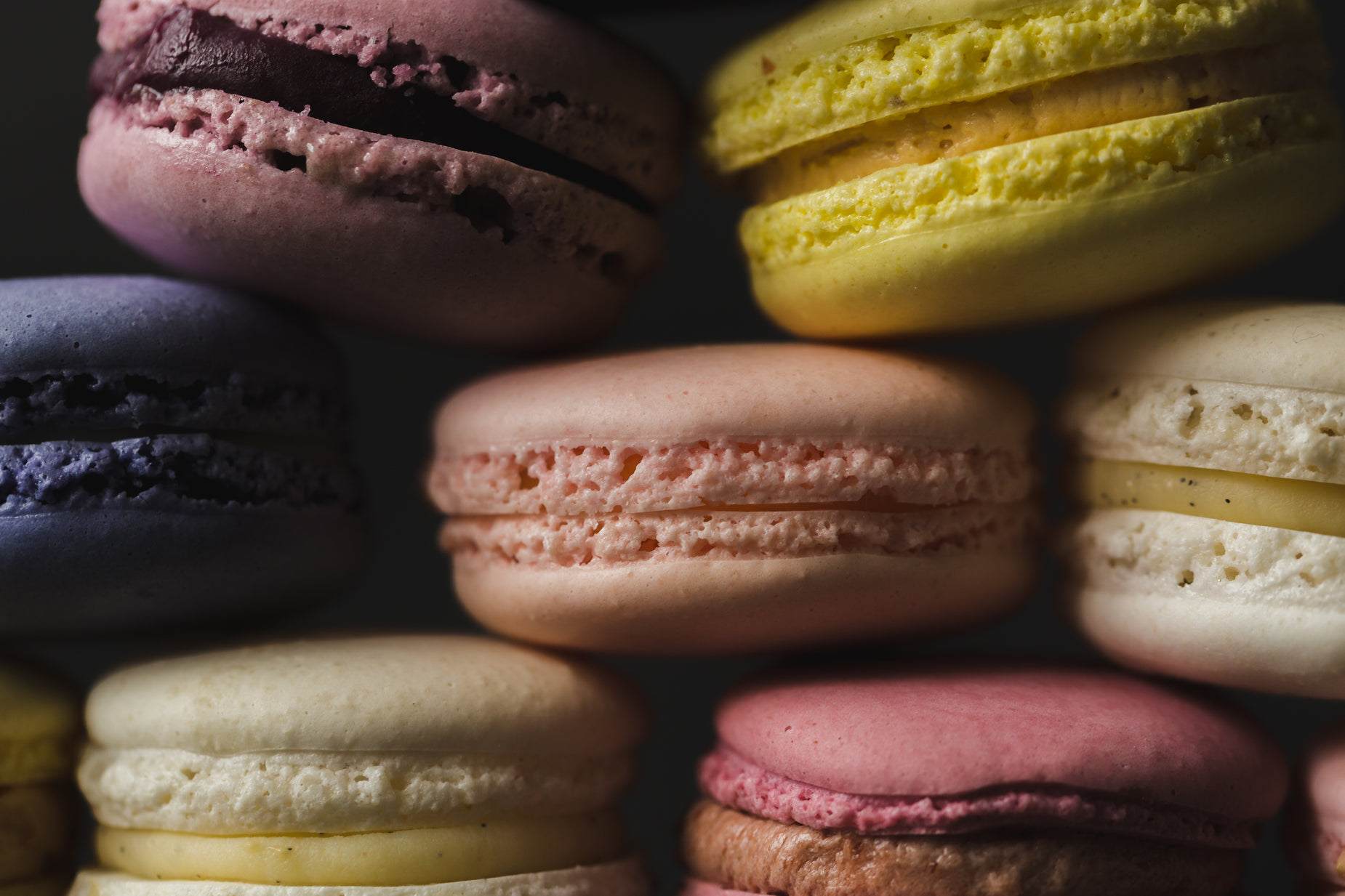 a closeup s of many different colored macaroons