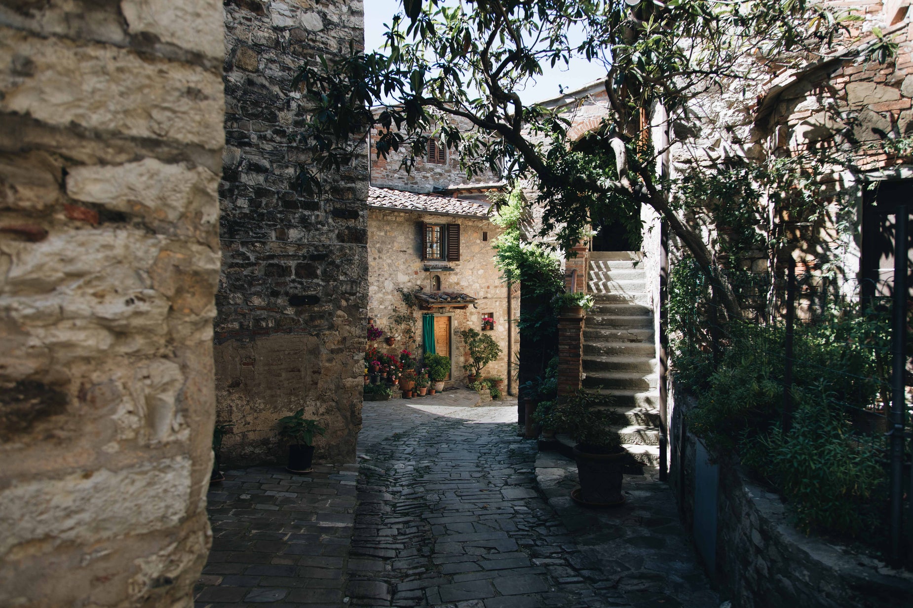 the stone street is between the stone buildings