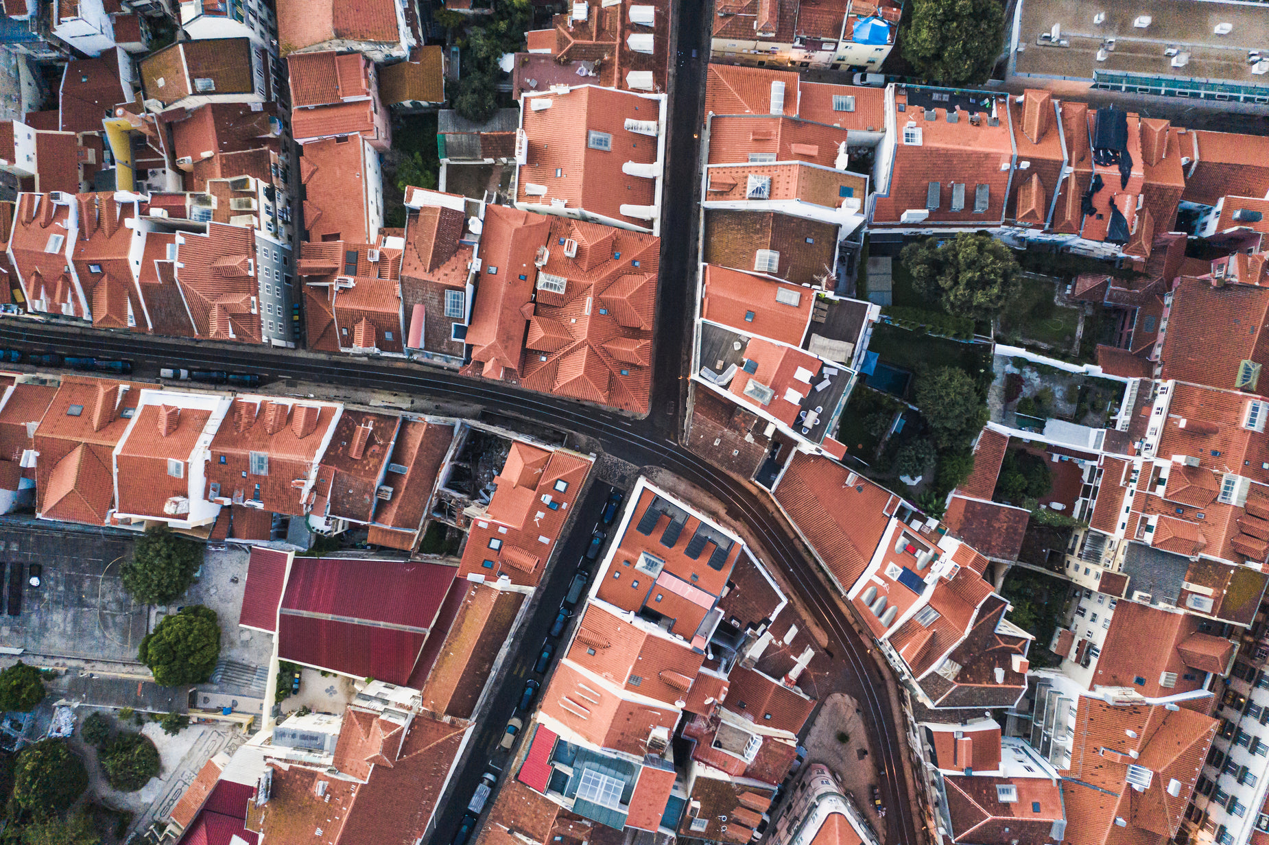 an aerial po of red roofs and blue building