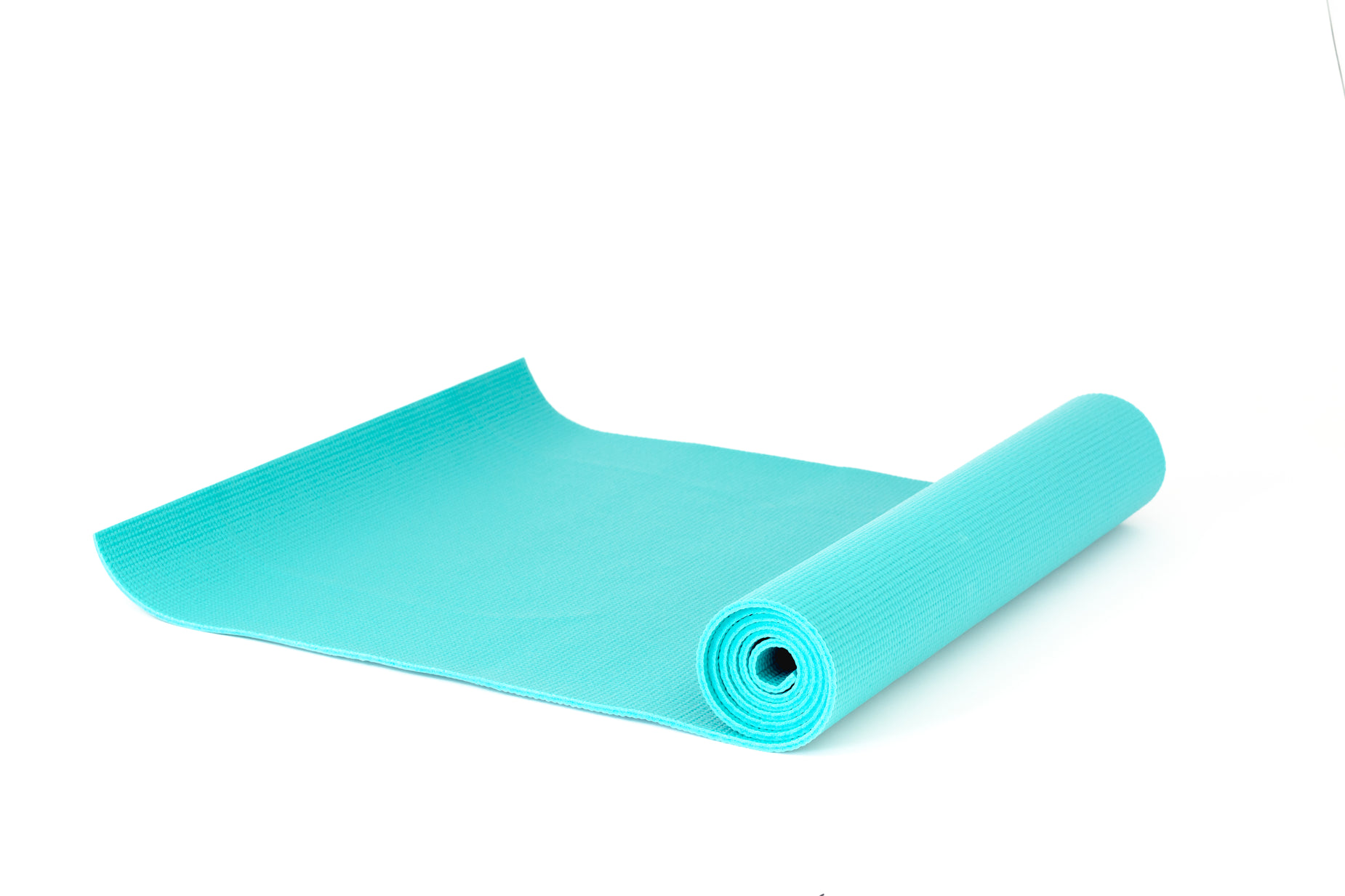 yoga mat rolled up on a white background