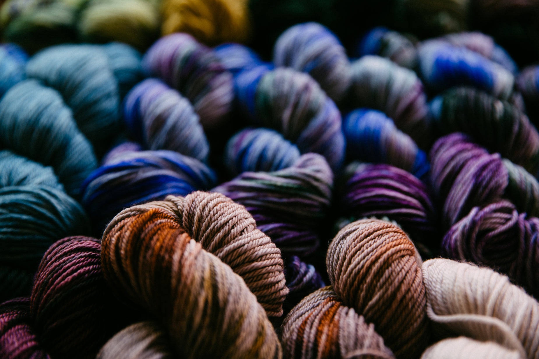 a close up po of skeins of yarn