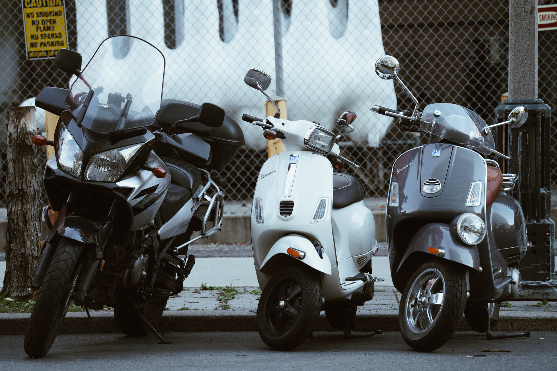 two motorcycles that are parked next to each other