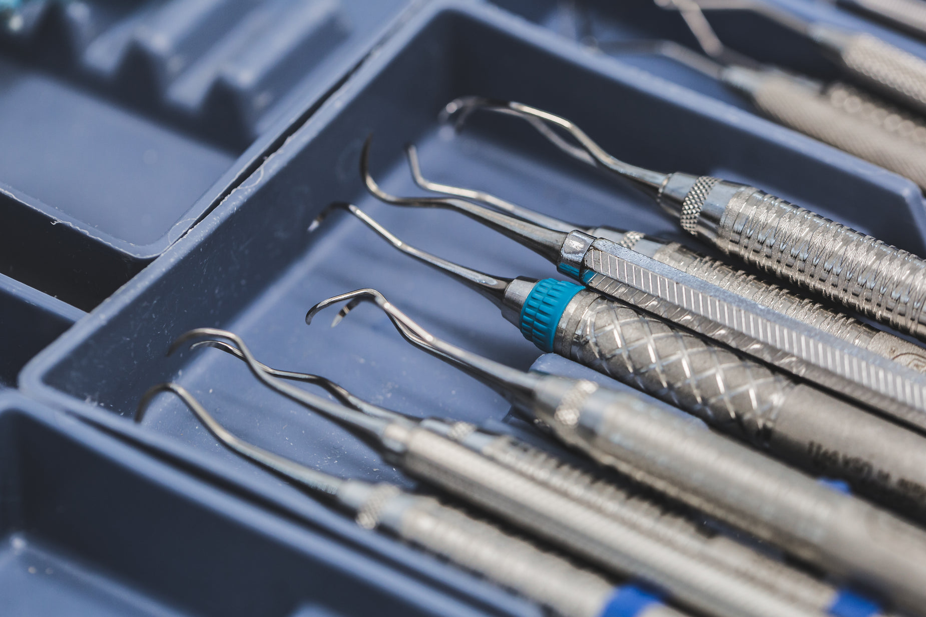 dental instruments in a storage tray on a table