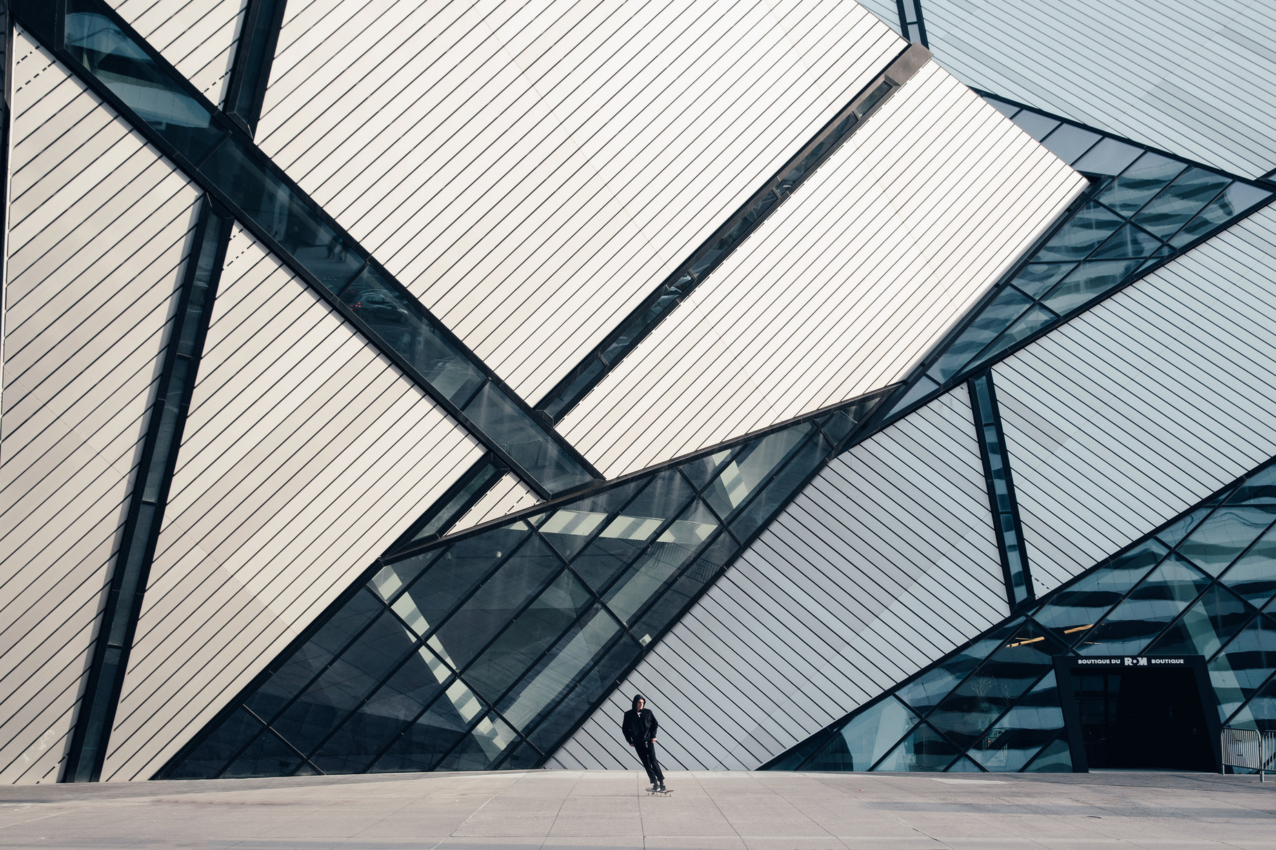 a man is standing in the middle of a building