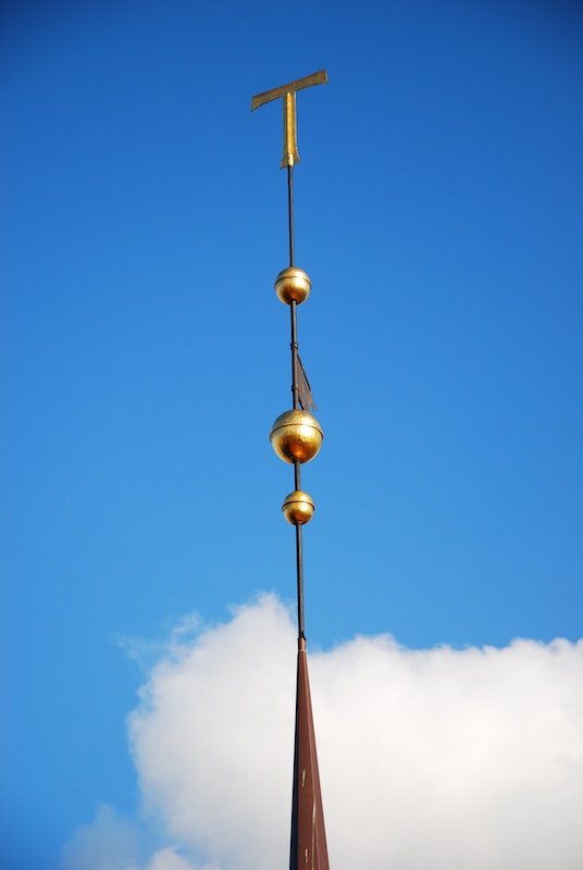 a clock tower has bells on it