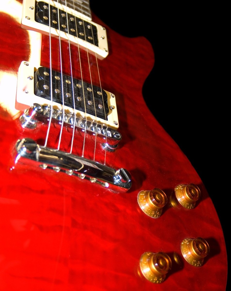 the top of a red electric guitar
