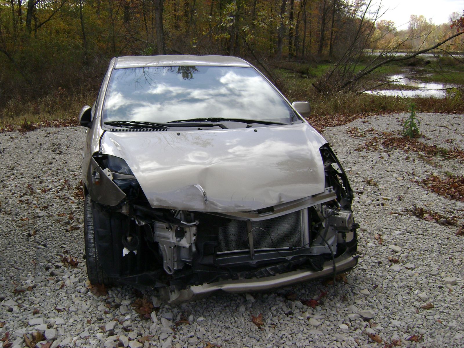 a car that has had it's front wheel smashed