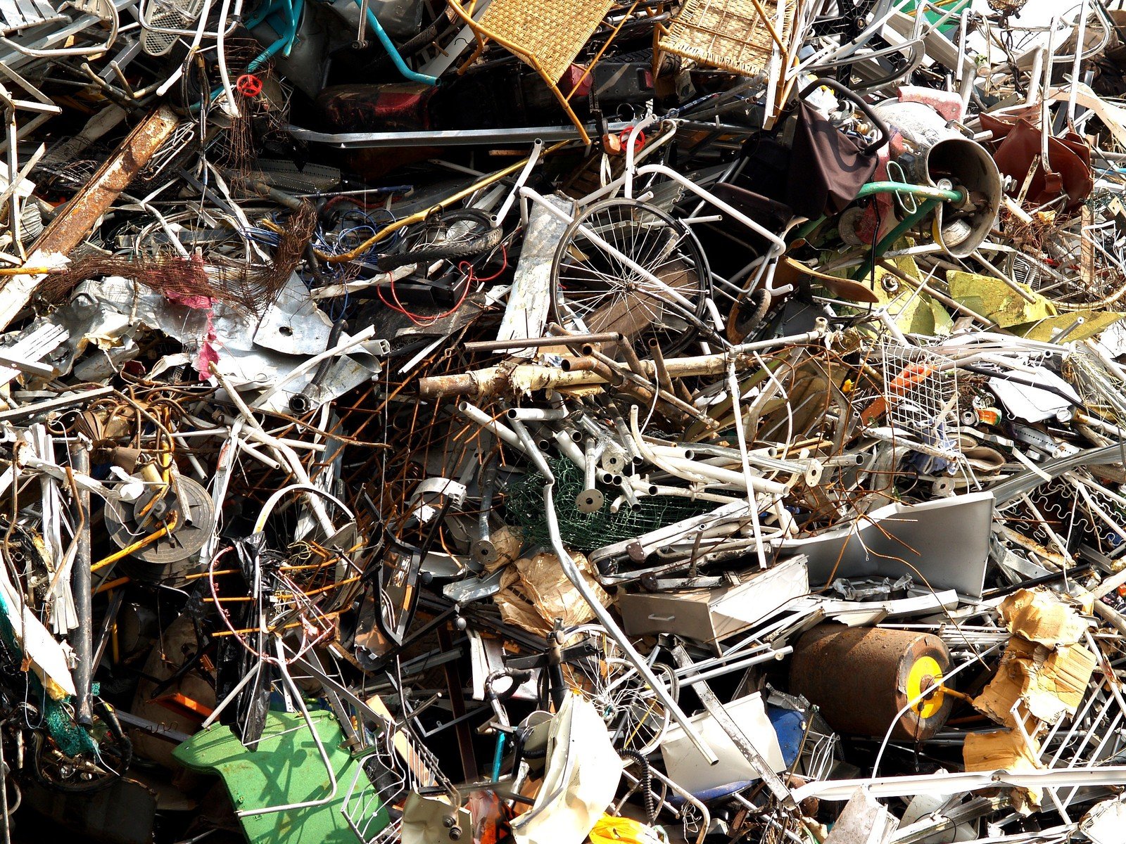 several random piles of electronic components with a lot of them scattered together