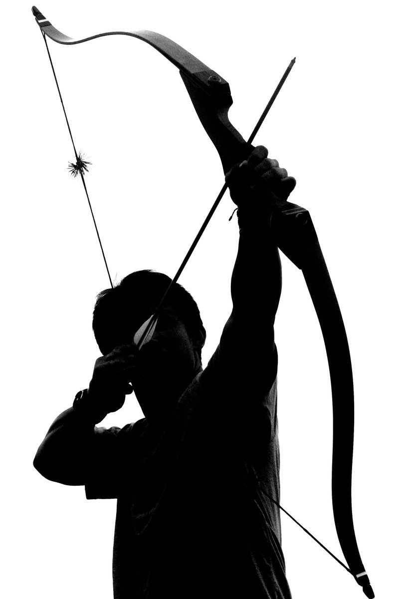 black and white silhouette of a man in the air, holding a bow, shooting arrow, and looking off into distance