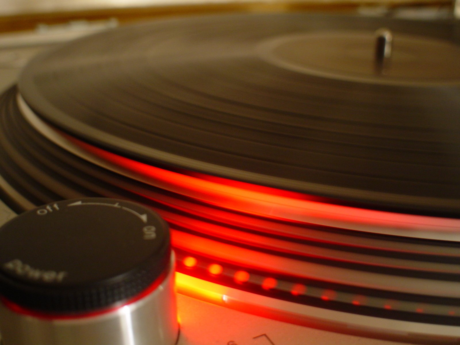 turntable with light - up plate and red colored lights