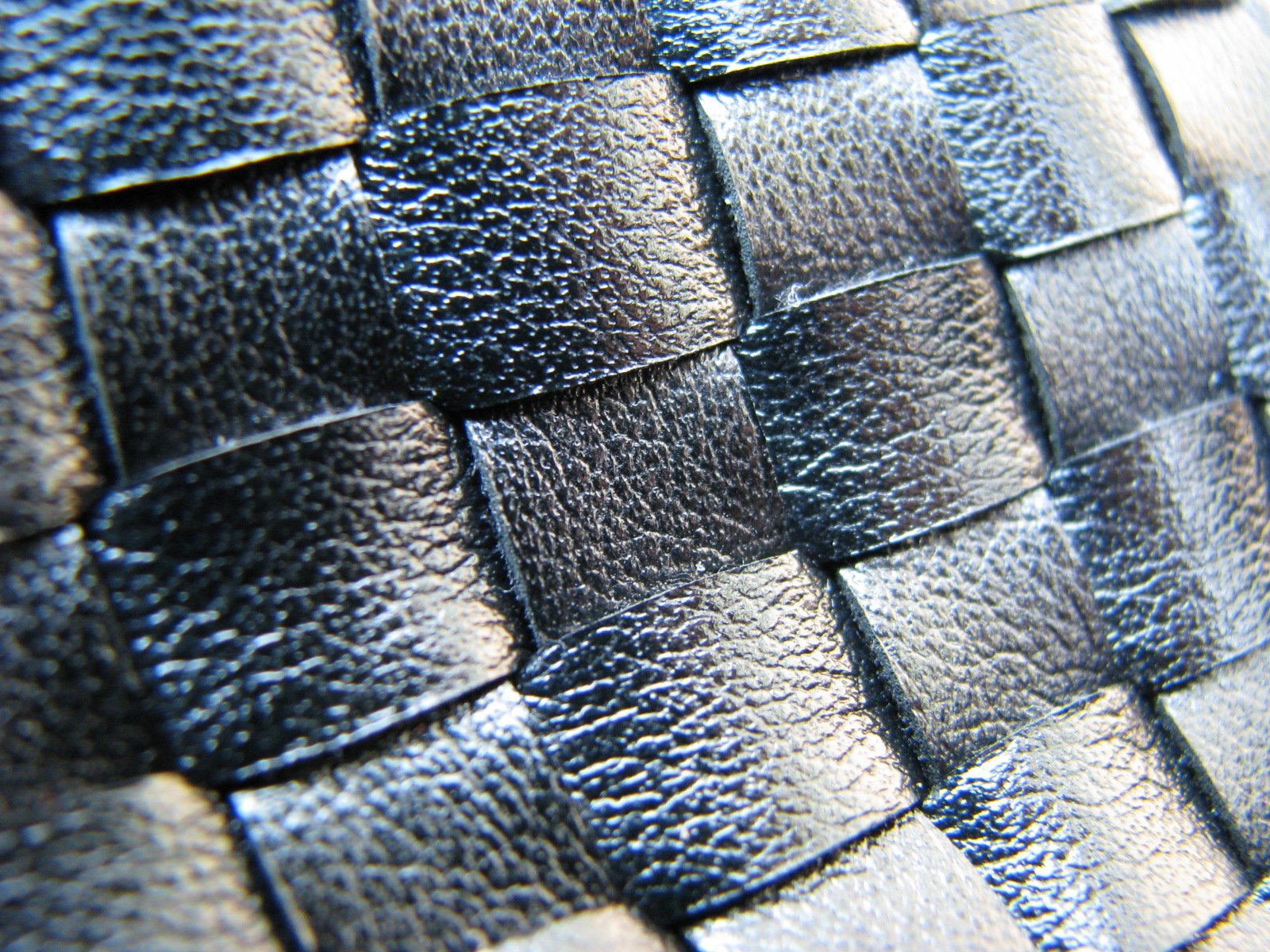 the blue leather texture has small squares on it