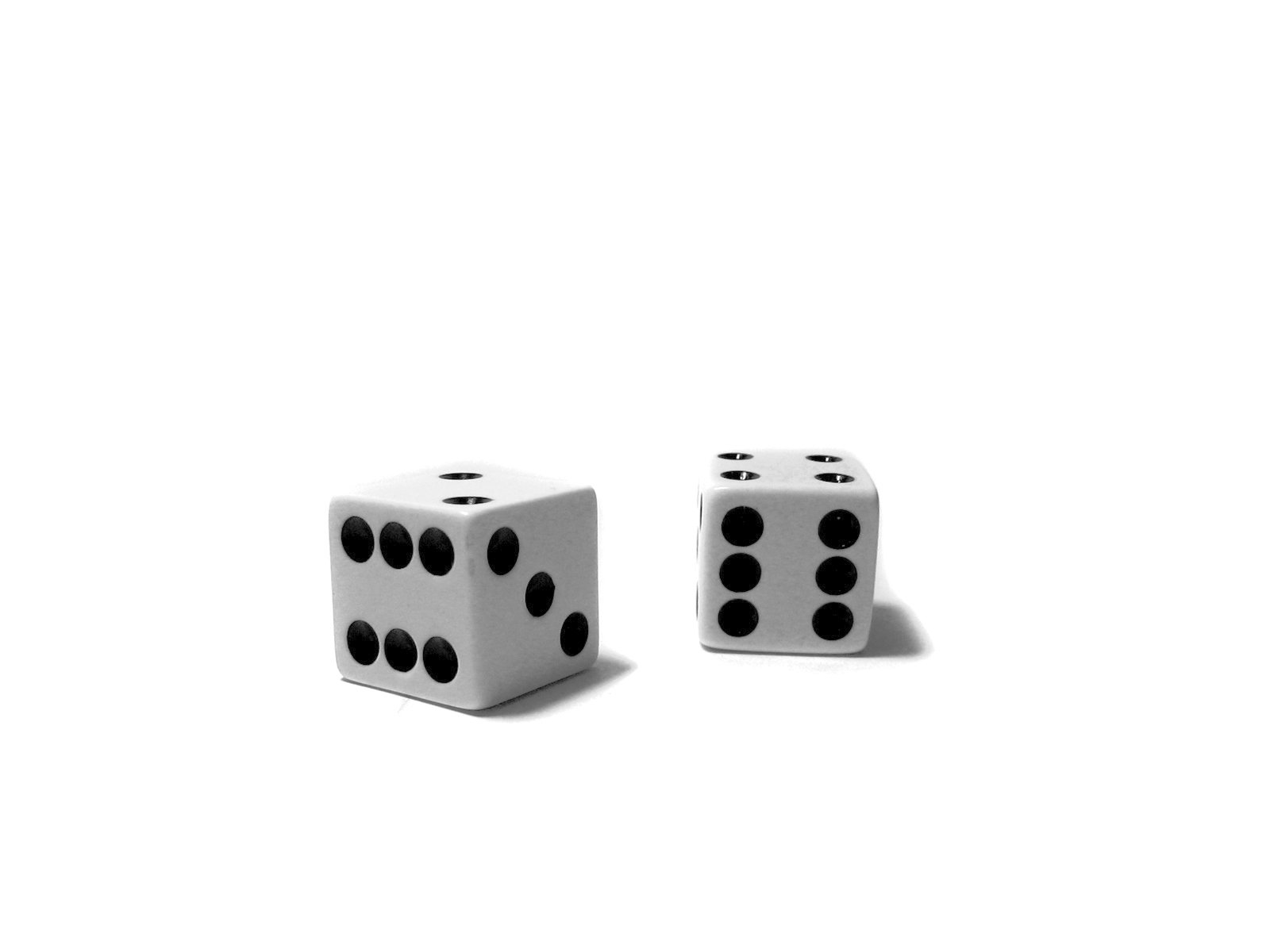 two dices of different sizes and shapes in the shape of four dots