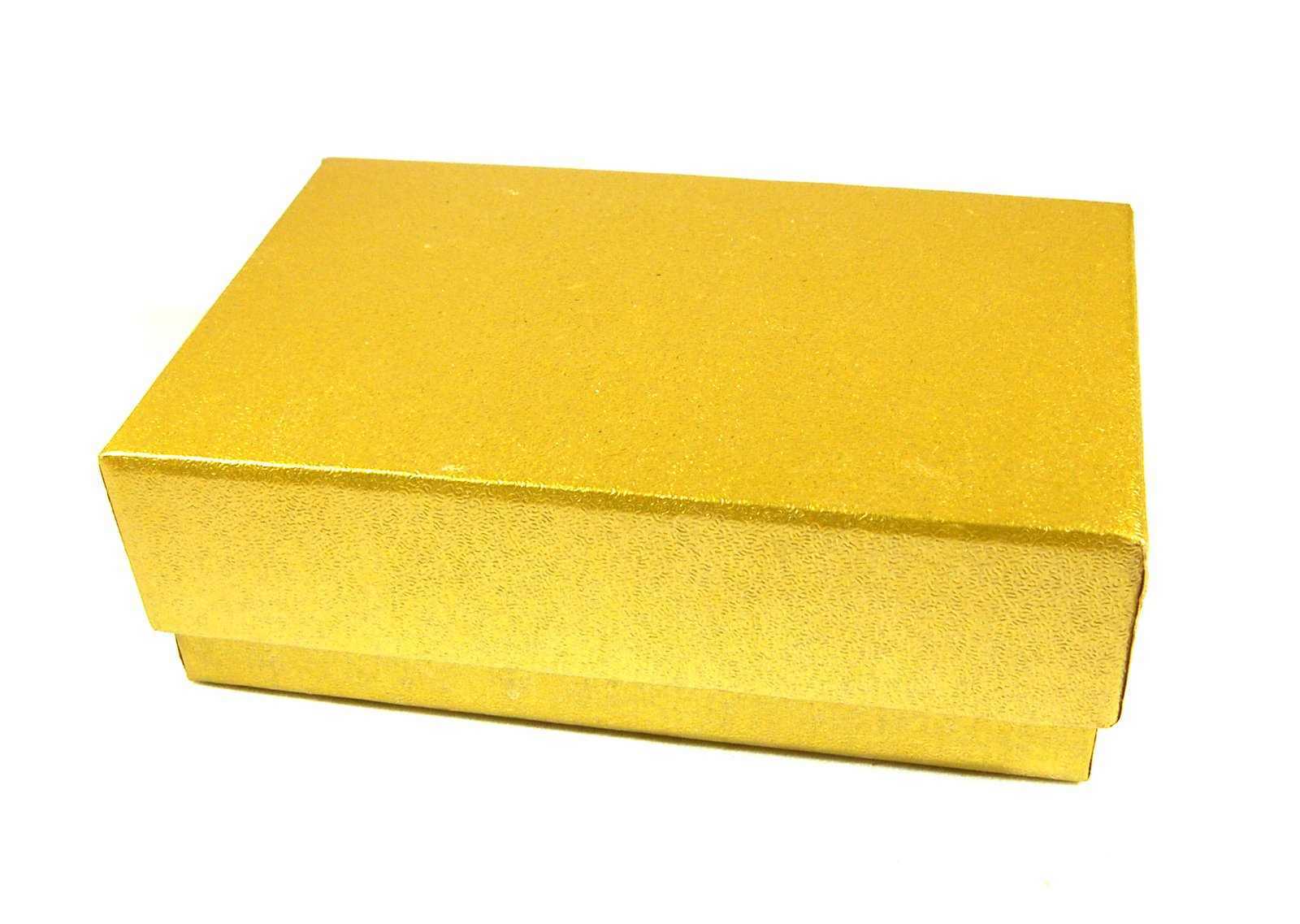 a yellow box on white surface with a shadow