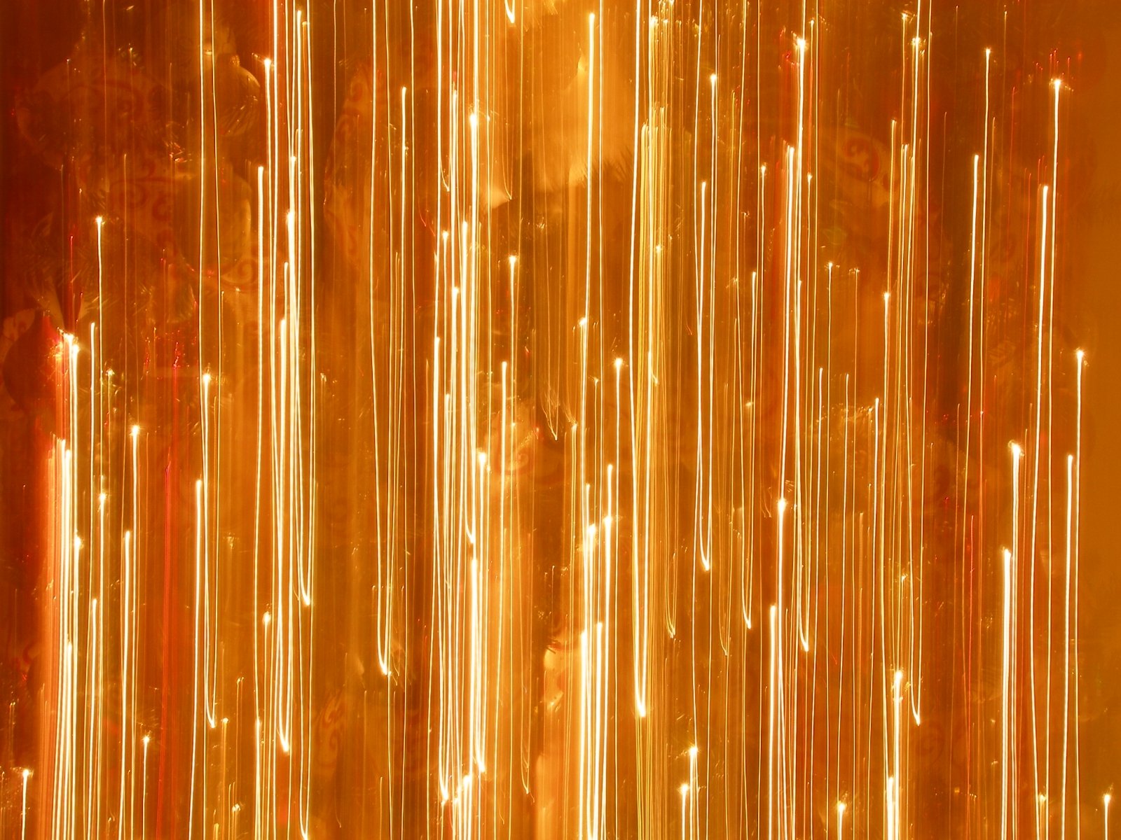 a close up view of golden lines of light