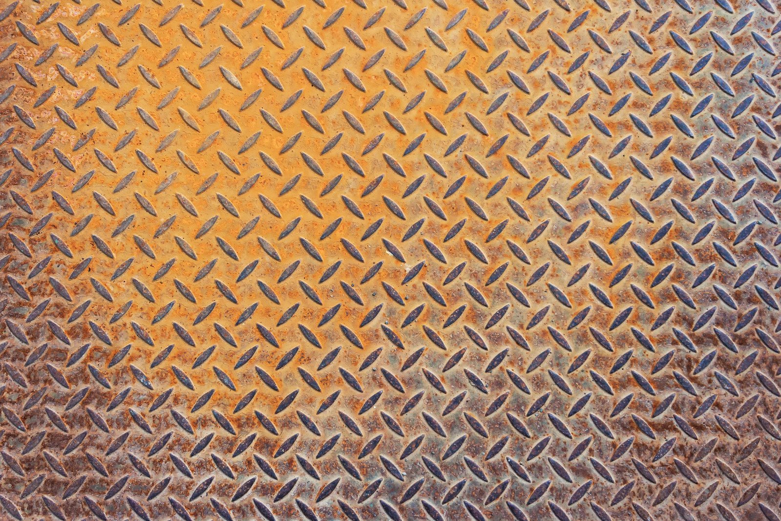 diamond plate background from the ceiling showing it is gold