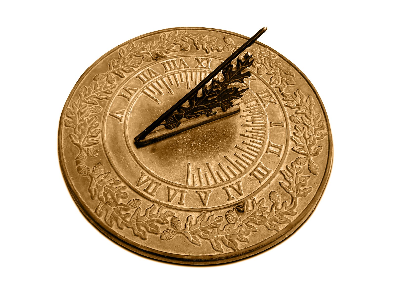 a close - up po of a sundial in gold