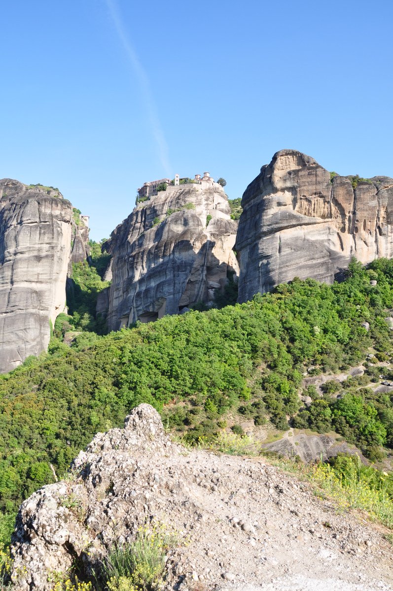 a very big pretty mountain with some trees in it