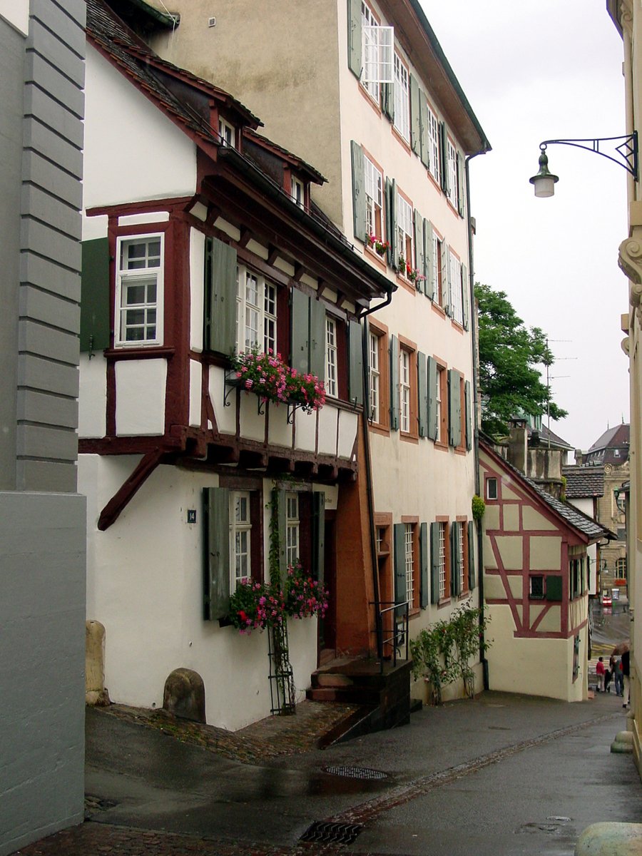 a small town street with many windows and two buildings