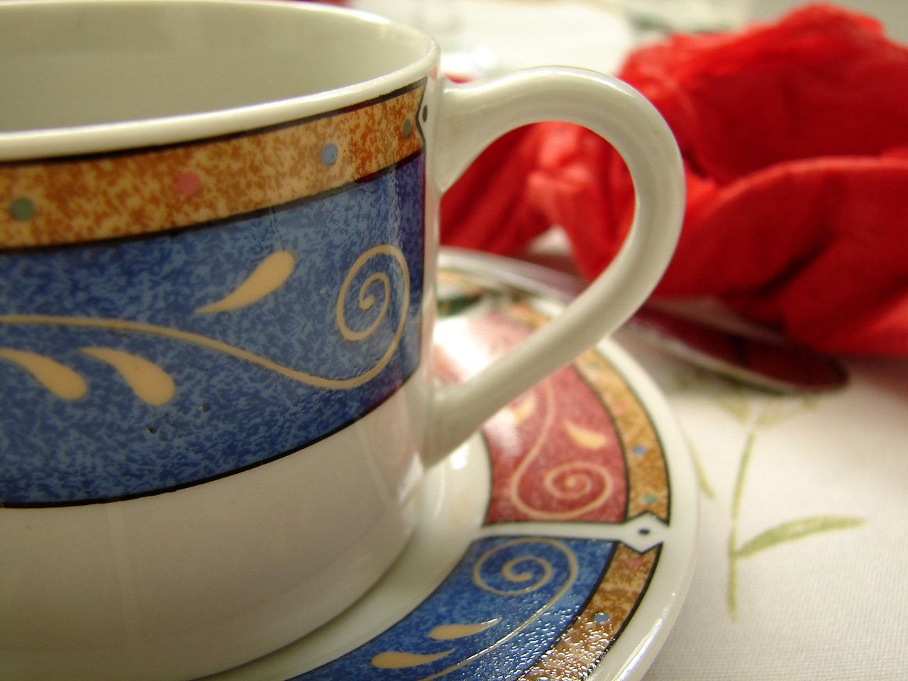 there is an image of a tea cup with a saucer