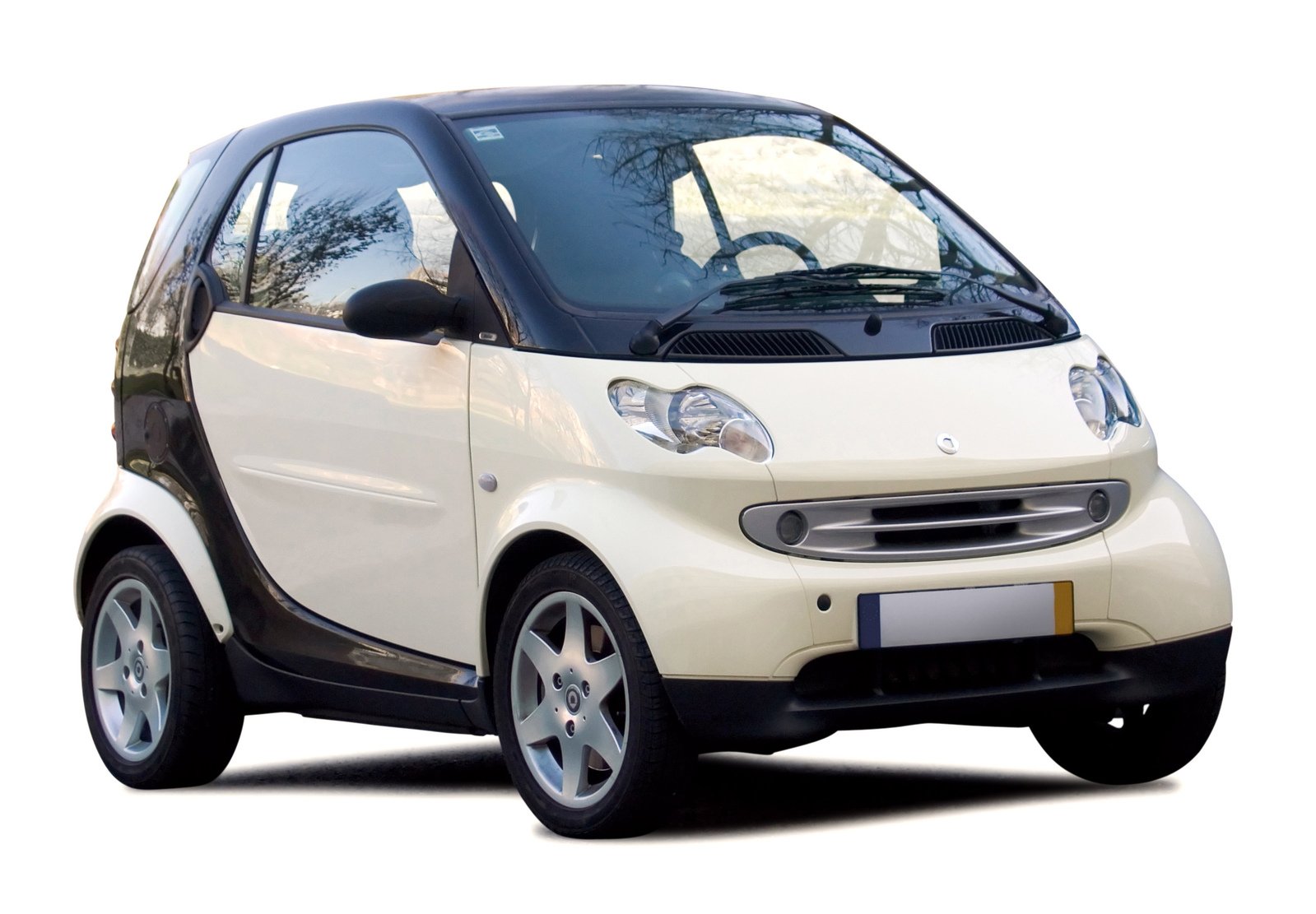 a smart car with black and white trim