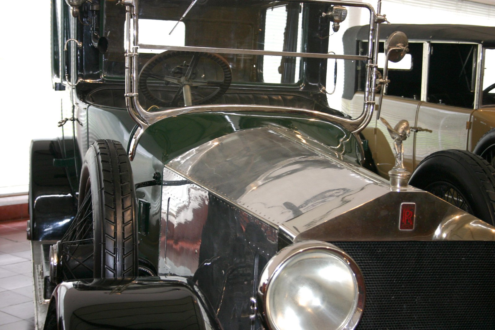 an old - fashioned truck sitting in a showroom