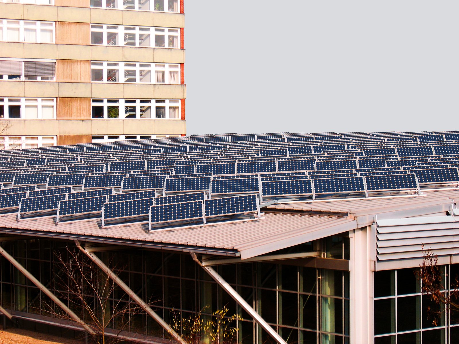 an image of a building that is full of solar panels
