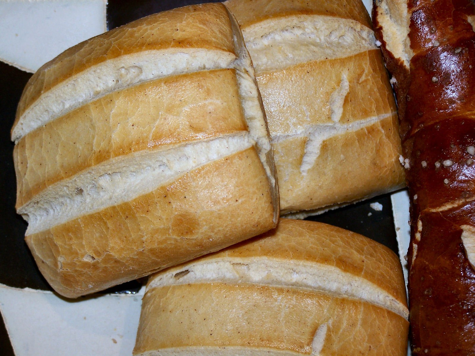 several pieces of bread wrapped in some sort of bread