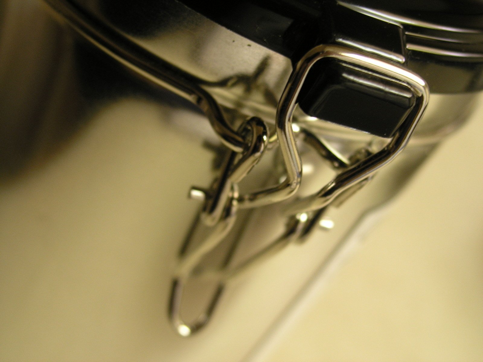 a close - up s of scissors in a kitchen sink