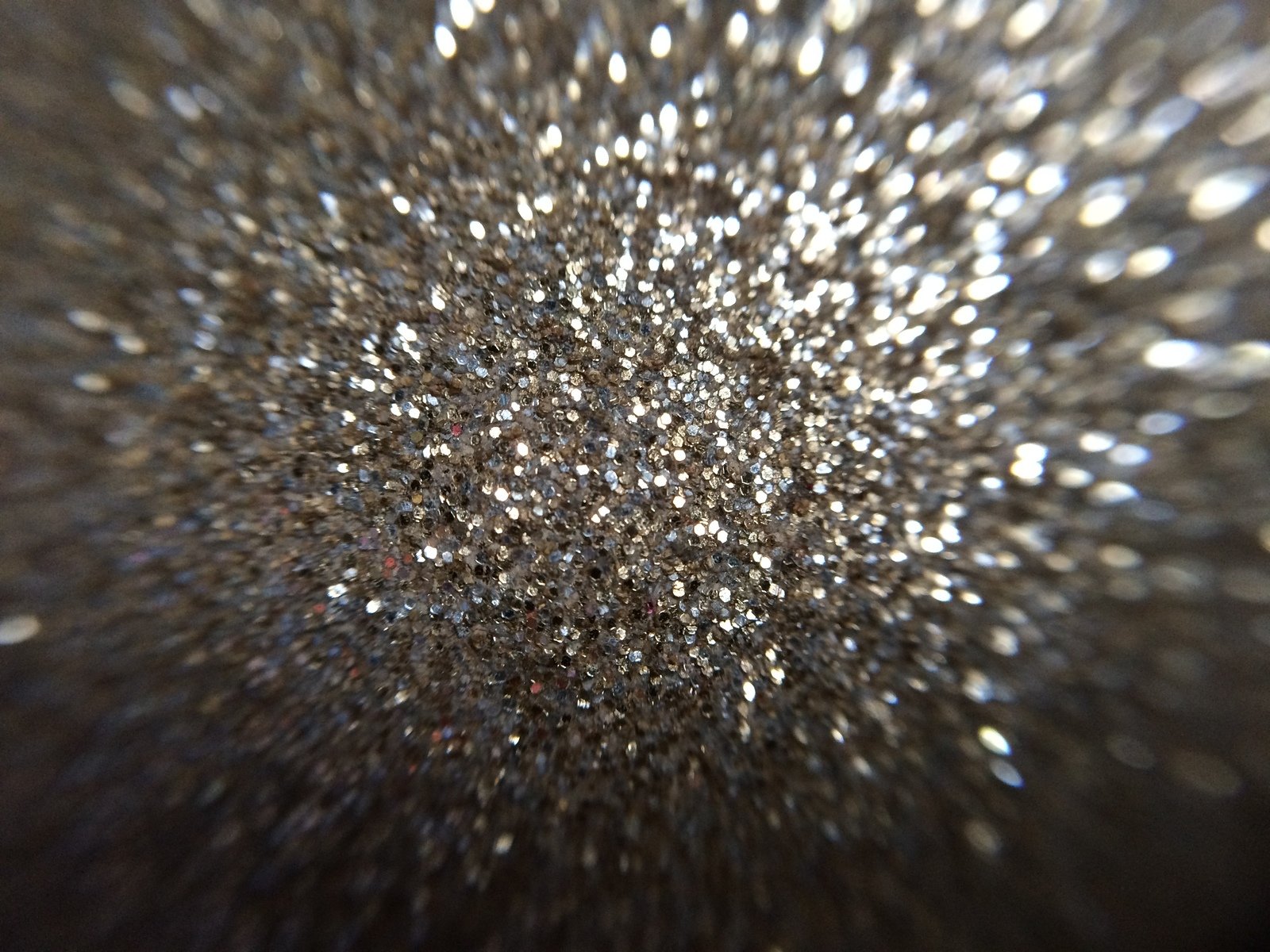 closeup of some very blurry silver sparkles