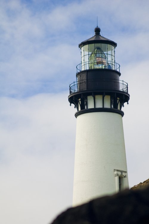 the lighthouse has two tall lights on it