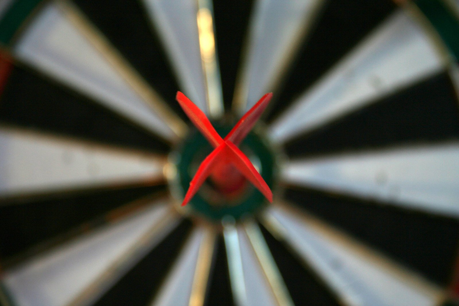 the red arrow is pointing toward a dart