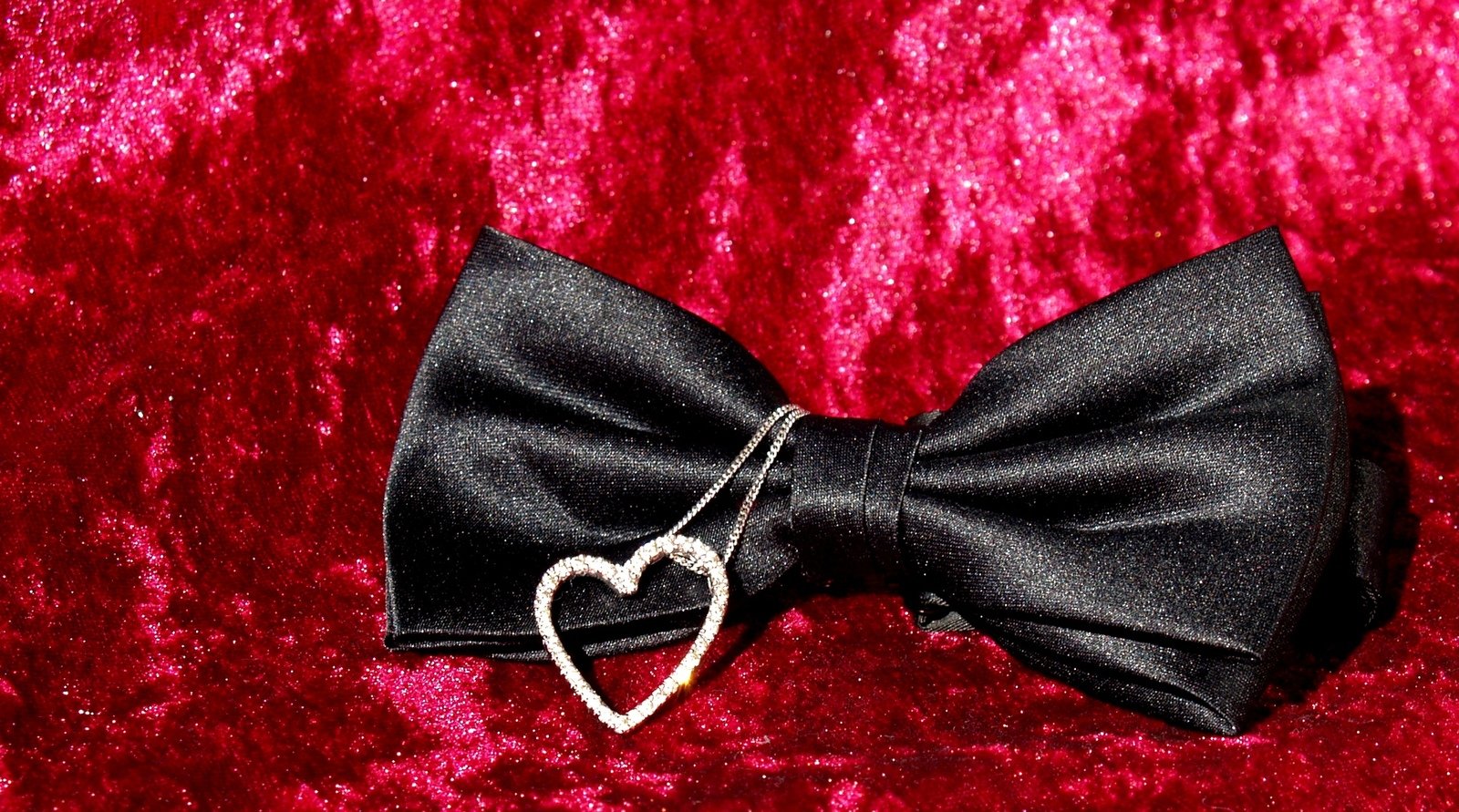 a bow tie with a heart on it