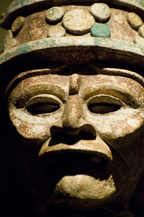 a ceramic head of an ancient egyptian man
