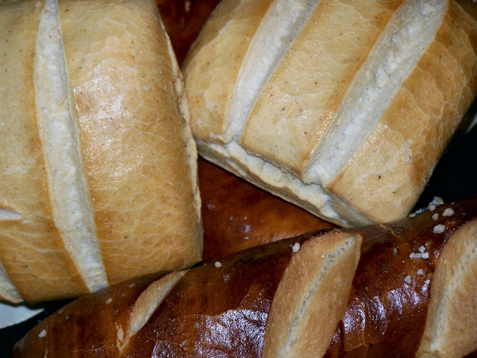 a close up of bread and loaves of loaves
