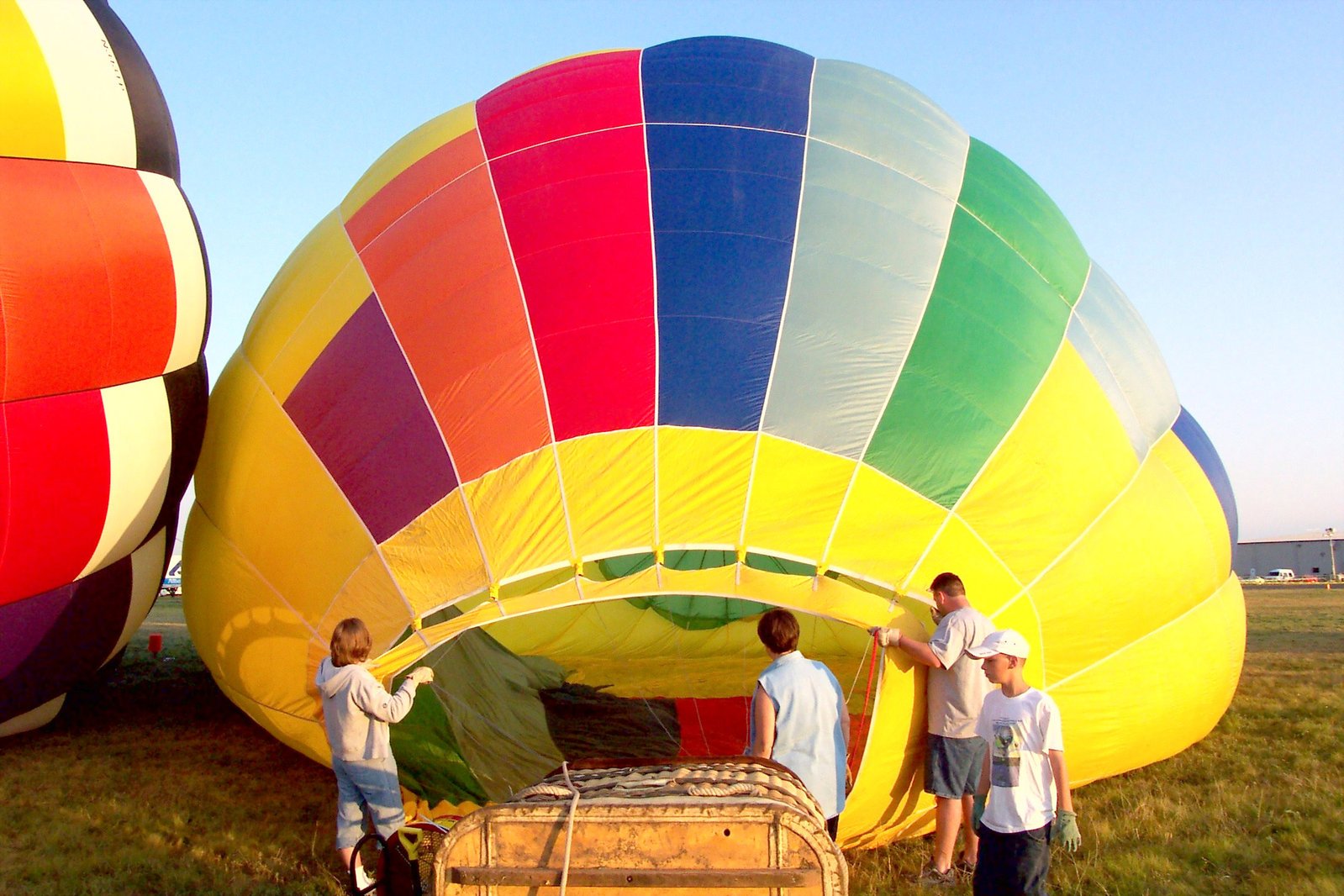 several people working together on a  air balloon