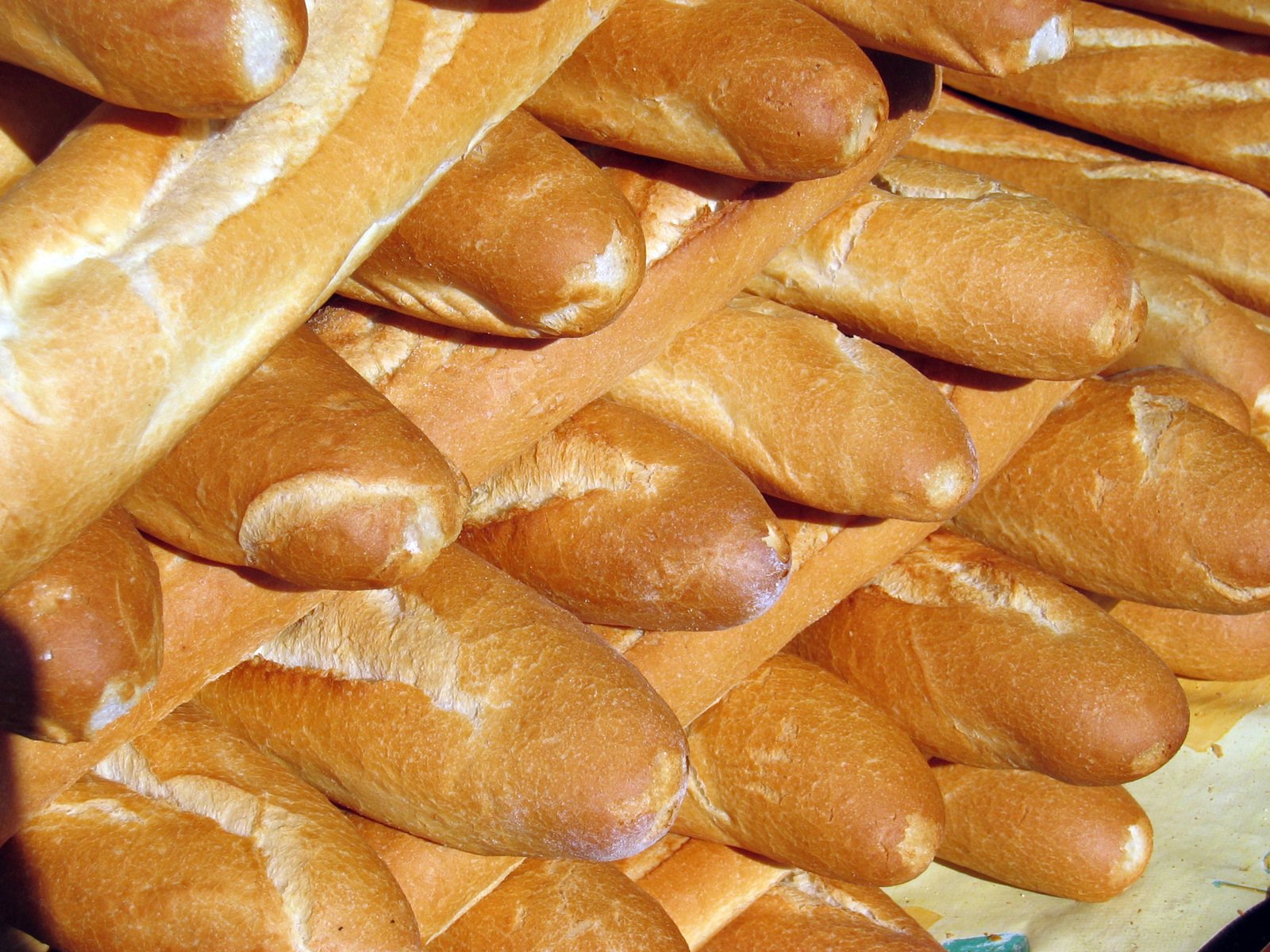 a close up of many ided breads